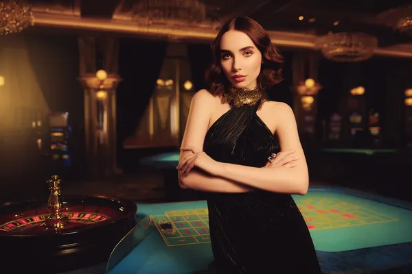 OKTKBD Jackpot Slots — Spin for massive rewards A dramatic shot of winning sevens landing on a slot reel surrounded by shining gold coins, symbolizing big wins.